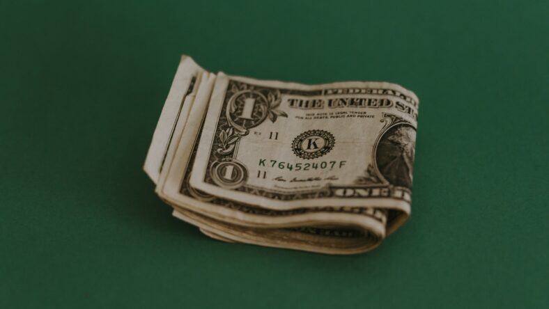 dollar bills on green background