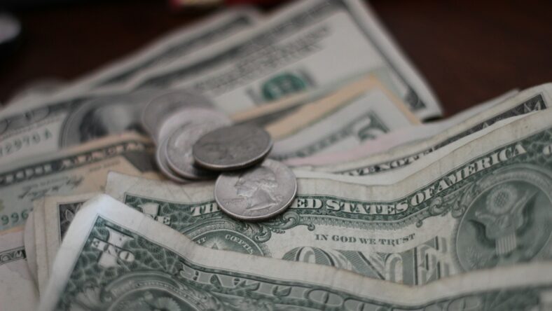 money and coins on a table