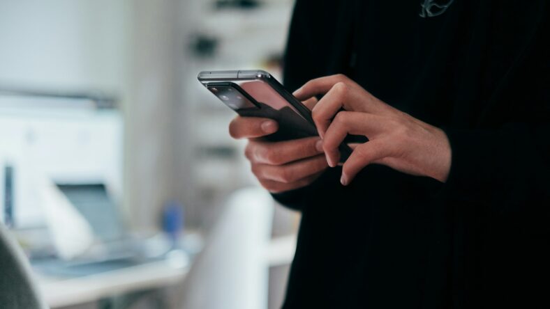 woman holding phone