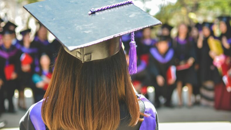 woman in cap and gown