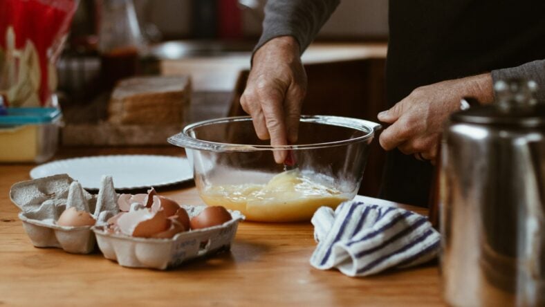 man whisking eggs / best Costco baking items