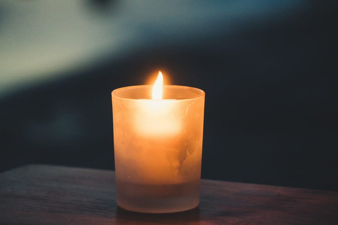 lit candle in the dark / costco home fragrance