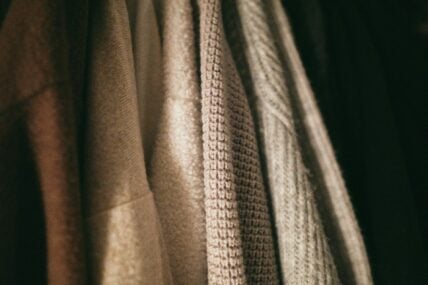 sweaters hanging in a row / costco fall clothing