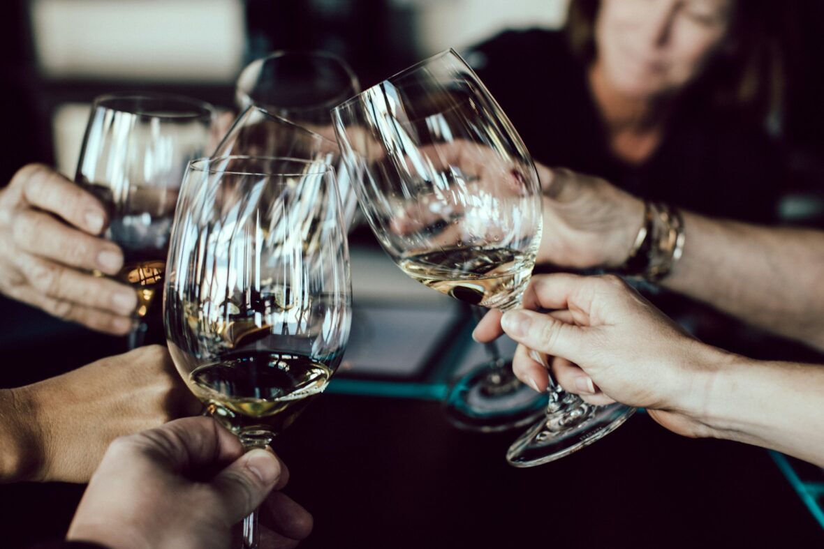 toasting with wine glasses / wines at costco