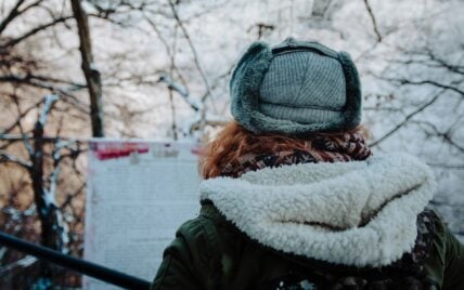 woman in a hat and winter coat / costco winter clothing