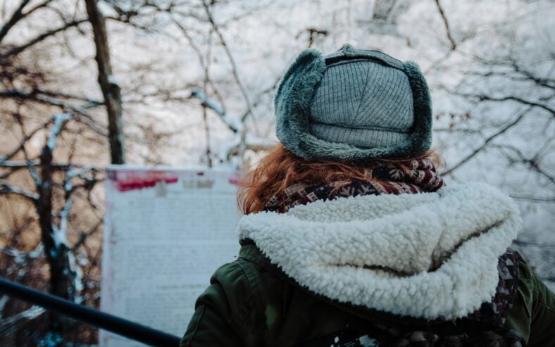 woman in a hat and winter coat / costco winter clothing