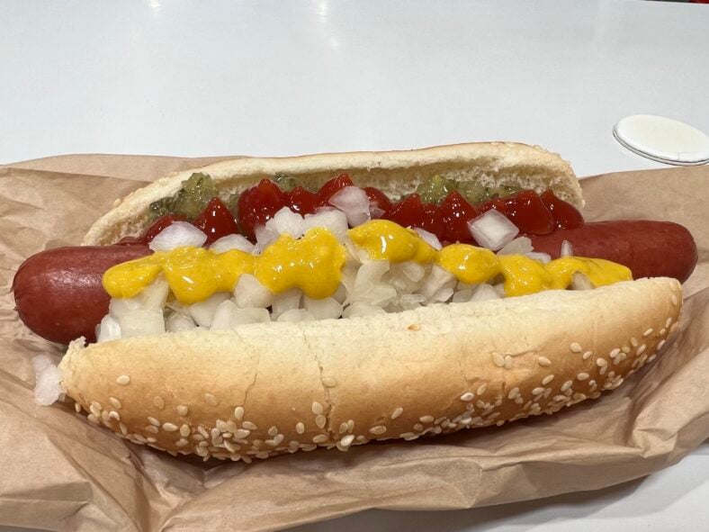 costco hot dog covered in toppings