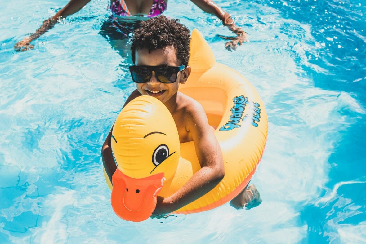 kid in a pool floatie / costco pool products