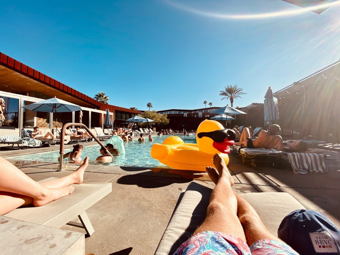 people siting at a pool / costco swimwear