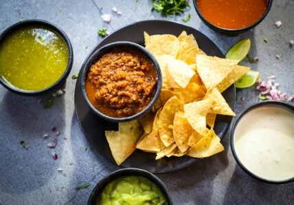 chips with different bowls of dips / dips at costco