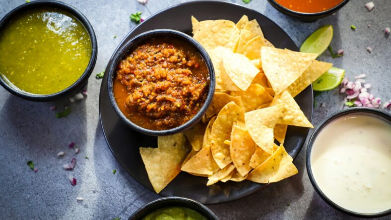 chips with different bowls of dips / dips at costco